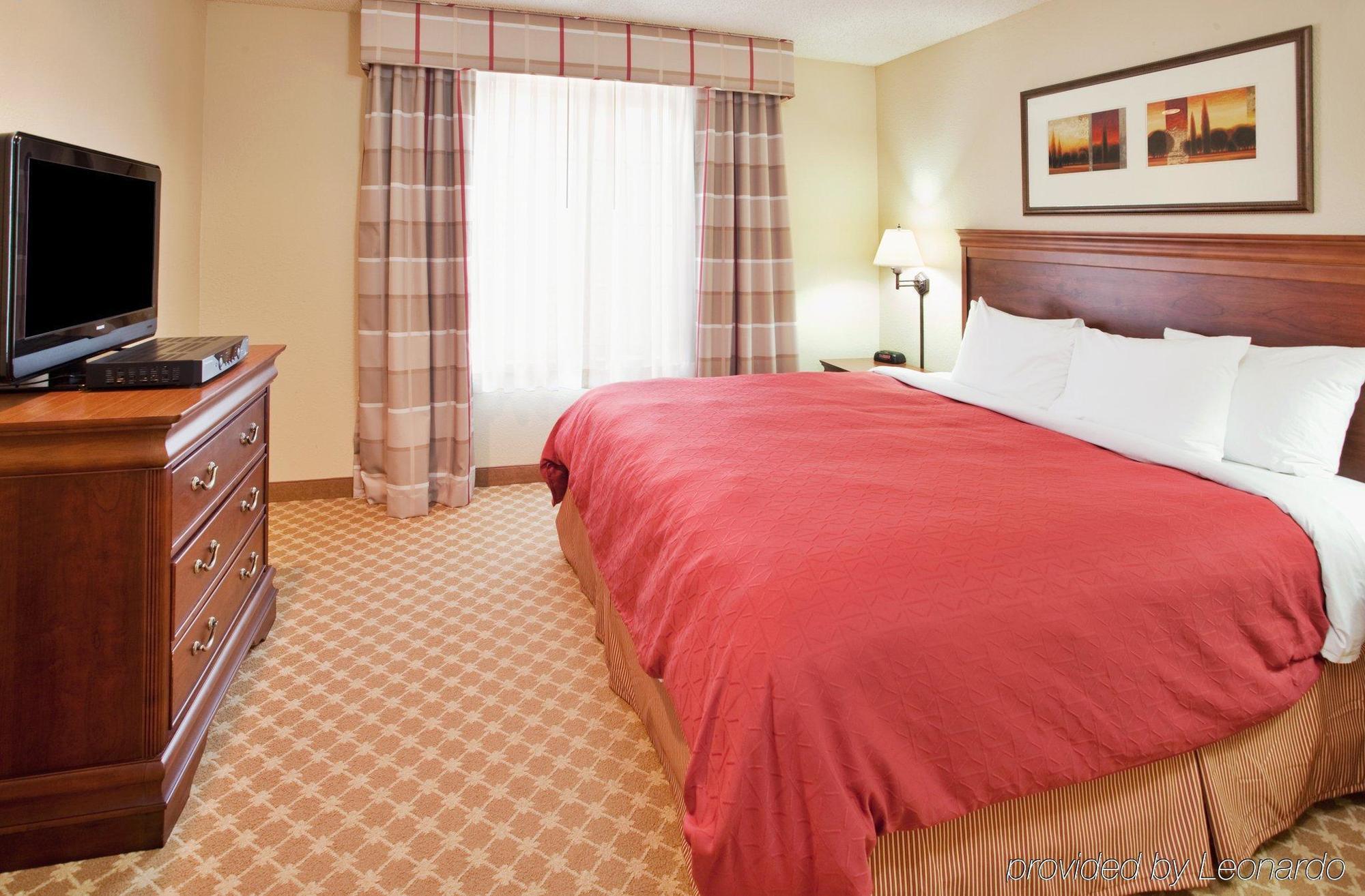 Country Inn & Suites By Radisson, Nevada, Mo Quarto foto