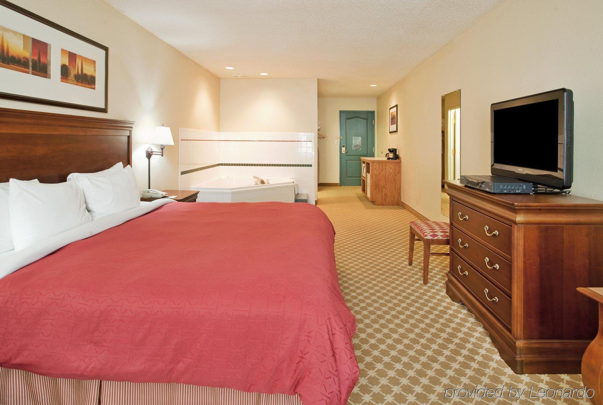 Country Inn & Suites By Radisson, Nevada, Mo Quarto foto