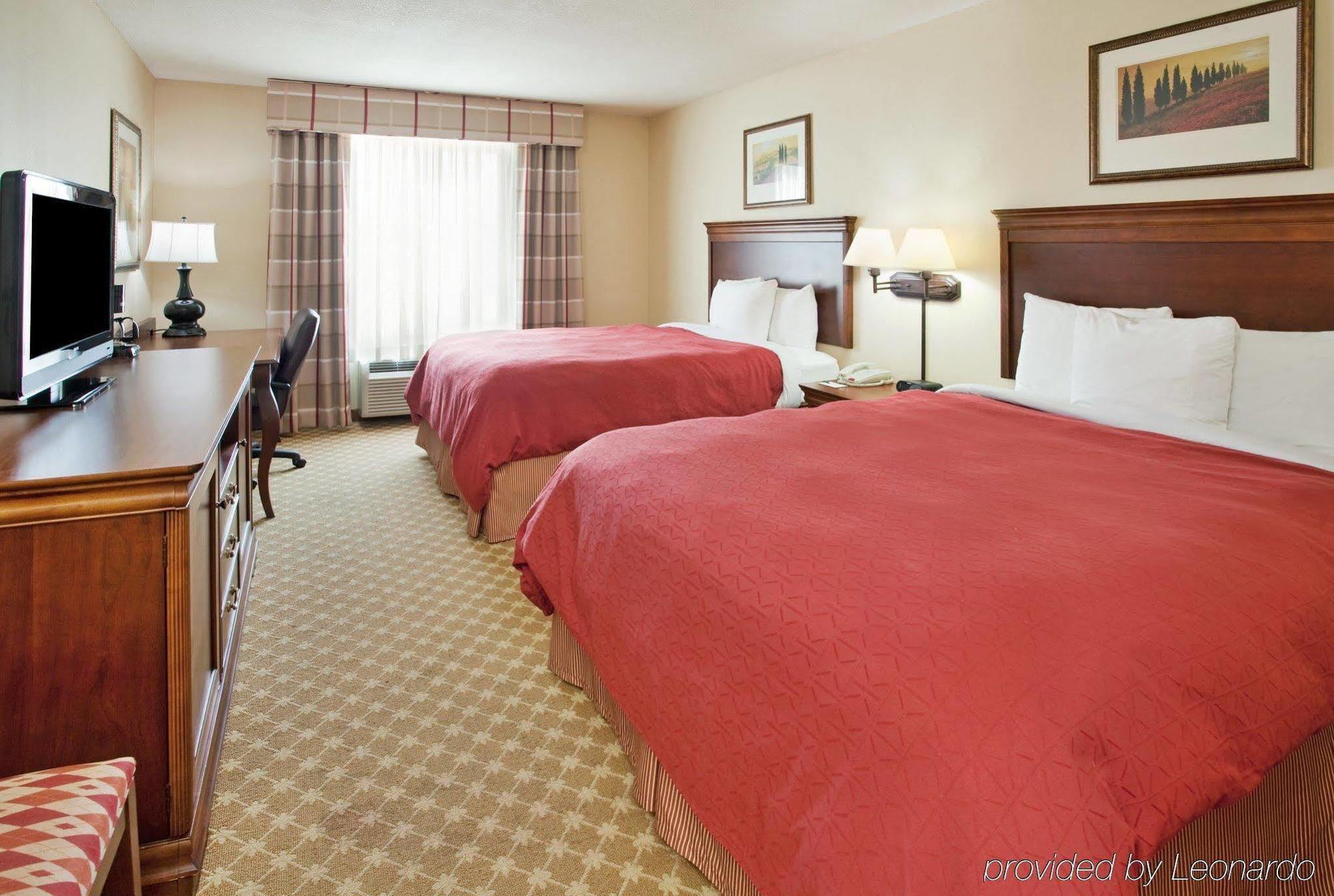 Country Inn & Suites By Radisson, Nevada, Mo Quarto foto