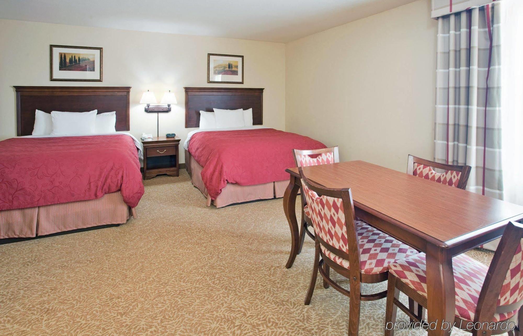 Country Inn & Suites By Radisson, Nevada, Mo Quarto foto